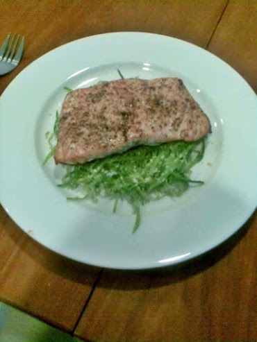 Salmon steak with snow pea salad